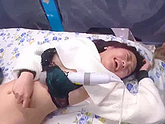 A machine vibrator is inserted into her, and she gives a blow job to her cock and cums on her face.